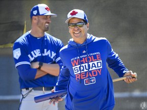 Toronto Blue Jays new manager Charlie Montoyo laughs during baseball spring training in Dunedin, Fla., on Thursday, February 14, 2019. THE CANADIAN PRESS/Nathan Denette