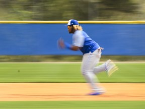 Blue Jays prospect Vladimir Guerrero Jr., here doing some running drills during spring workouts, had an adventurous afternoon on the basepaths in the team’s 9-8 exhibition loss to the Orioles in Sarasota.  THE CANADIAN PRESS