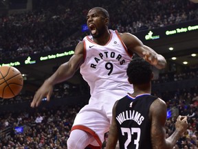 Toronto Raptors centre Serge Ibaka (9) reacts after dunking on L.A. Clippers guard Lou Williams (23)during first half NBA basketball action in Toronto on Sunday Feb. 3, 2019. THE CANADIAN PRESS/Frank Gunn ORG XMIT: FNG508