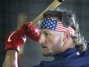 Atlanta Braves newly acquired Josh Donaldson takes batting practice during baseball spring training on Sunday, Feb. 17, 2019, in Lake Buena Vista, Fla.