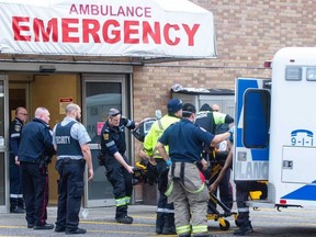 Emergency personnel responded to a double shooting in Rexdale on Sunday afternoon. One man is dead and another is in hospital. (Victor Biro photo)