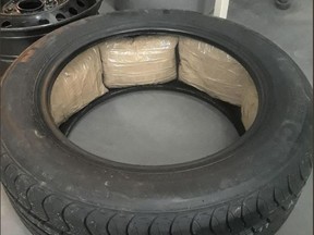 Drugs are seen in a tire of a vehicle built in Mexico and shipped to Canada. (OPP_News/Twitter)