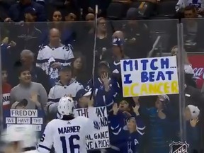 Maple Leafs' Mitch Marner tosses his stick to cancer survivor Brock Chessell at Scotiabank Arena on Feb. 4, 2019. (Screengrab)
