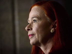 President and CEO of CBC/Radio-Canada Catherine Tait looks on during a press conference in the foyer of the House of Commons on Parliament Hill in Ottawa on April 3, 2018.