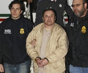 Welcome to the USA! El Chapo arrives on a plane after being extradited from Mexico. THE ASSOCIATED PRESS
