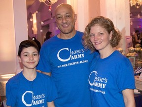 Cancer survivor Chase Sandy, 13, with his parents Tamara and Jeff, both Halton Regional Police officers, started Chase's Gift to help other families in need of some financial help when their kids are sick. (Facebook)