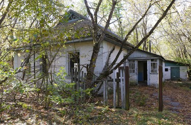 This abandoned home is among the crumbling buildings in the former farmer's village of Zalissya, located inside the Chornobyl disaster exclusion zone in Ukraine. (Chris Doucette/Toronto Sun/Postmedia Network)