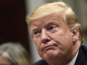 U.S. President Donald Trump listens during a meeting with Hispanic pastors in the Roosevelt Room of the White House in Washington, Friday, Jan. 25, 2019.