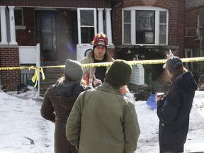 Residents of a century-old home on Temple Ave., escaped an early-morning fire that broke out in a basement apartment on Saturday, Feb. 9, 2019. (Jack Boland/Toronto Sun/Postmedia Network)