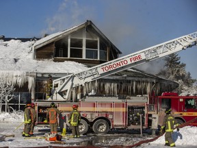 Firefighters during the second day of the fire at Agincourt Recreation Centre, near Midland Ave. and Sheppard Ave E., on Friday, Feb. 1, 2019. (Ernest Doroszuk/Toronto Sun/Postmedia)