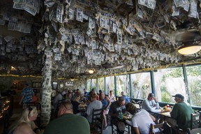 The dollar bill-covered inside of Cabbage Key Inn and Restaurant on the island of Cabbage Key. Previous visitors have taped thousands of one-dollar bills to every surface. Ernest Doroszuk/Toronto Sun