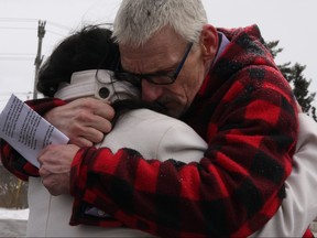 Colin and Tammy Bullock are pictured embracing recently outside of court. (Tracy McLaughlin photo)