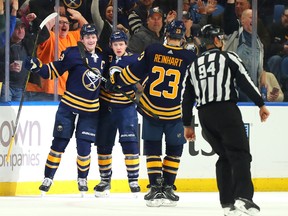 After being dispersed to three different lines, Sabres' Jack Eichel (left) and Jeff Skinner were hastily re-united, but without Sam Reinhart -- for now. (Photo by Kevin Hoffman/Getty Images)