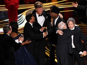 The cast and crew of 'Green Book' accept the Best Picture award during the 91st Annual Academy Awards at the Dolby Theatre in Los Angeles on Sunday, Feb. 24, 2019.