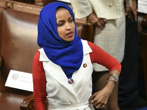 In this file photo taken on Feb. 5, 2019 Representative for Minnesota Ilhan Omar  is seen in the audience ahead of U.S. President Donald Trump's State of the Union address at the U.S. Capitol in Washington, D.C.