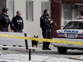 Police at the scene of a mid-morning shooting near Lotherton Pathway and Caledona Rd. in Toronto on Tuesday, Feb. 19 2019.