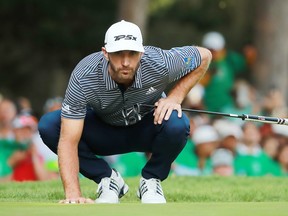 Dustin Johnson lines up a putt on the 18th green during the final round of World Golf Championships-Mexico Championship on Saturday at Club de Golf Chapultepec in Mexico City. (Hector Vivas/Getty Images)