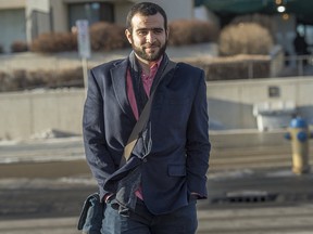 Omar Khadr leaves the courthouse in Edmonton on Dec. 21, 2018, after a judge denied his request for bail changes.