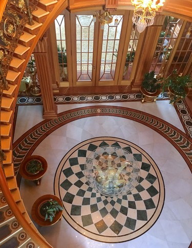 The main stairwell inside the lavish mansion where former Ukrainian president Viktor Yanukovych lived with his mistress until his ouster in 2014. (Chris Doucette/Toronto Sun/Postmedia Network)