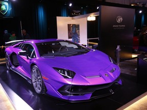 A purple Lamborghini is seen in the Auto Exotica exhibit at the Canadian International Auto Show in the Metro Toronto Convention Centre on Friday, Feb. 15, 2019. (Jack Boland/Toronto Sun/Postmedia Network)