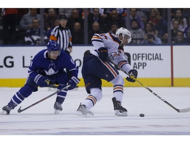 Edmonton Oilers Connor McDavid C (97) wheels across the blue line at Toronto Maple Leafs Zach Hyman C (11) during the first period in Toronto on Thursday February 28, 2019. Jack Boland/Toronto Sun/Postmedia Network