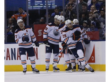 Edmonton Oilers Leon Draisaitl C (29) is congratulated after scoring the opening goal the game during the first period in Toronto on Wednesday February 27, 2019. Jack Boland/Toronto Sun/Postmedia Network