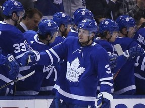 Toronto Maple Leafs Auston Matthews C (34) is congratulated after scoring during the second period in Toronto on Monday February 25, 2019. Jack Boland/Toronto Sun/Postmedia Network