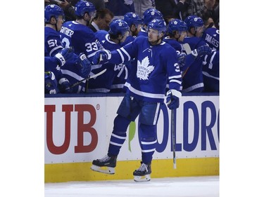 Toronto Maple Leafs Auston Matthews C (34) is congratulated after scoring during the second period in Toronto on Monday February 25, 2019. Jack Boland/Toronto Sun/Postmedia Network