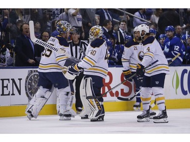 Buffalo Sabres make a goalie change after Buffalo Sabres Carter Hutton G (40) let in three goals in just under three minutes during the second period in Toronto on Monday February 25, 2019. Jack Boland/Toronto Sun/Postmedia Network