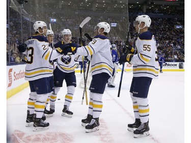 Teammates congratulate Buffalo Sabres Sam Reinhart C (23) on his goal during the second period in Toronto on Tuesday February 26, 2019. Jack Boland/Toronto Sun/Postmedia Network