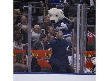 Sting and Carlton the Bear during a break in the action during the first period in Toronto on Monday February 25, 2019. Jack Boland/Toronto Sun/Postmedia Network