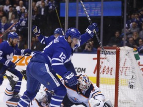 Maple Leafs Patrick Marleau C (12) beats Edmonton Oilers' Mikko Koskinen  during the first period  on Wednesday night. Jack Boland/Toronto Sun/Postmedia Network