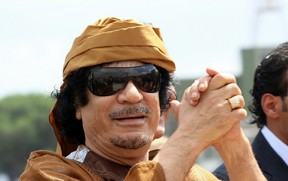 Former Libyan dictator Muammar Gaddafi arrives at Ciampino airport in Rome on August 29, 2010. (Photo by Ernesto Ruscio/Getty Images)