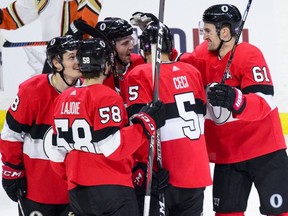 Senators right wing Mark Stone (right) celebrates a goal with teammates as they take on the Ducks during third period NHL action in Ottawa on Feb 7, 2019.
