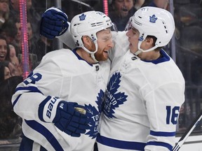 A few hours after Mitch Marner (right) posed for a photo with an adoring fan, he celebrated with  Connor Brown after Brown set up Marner on a third-period short-handed goal against the Vegas Golden Knights on February 14, 2019 in Las Vegas, Nevada. (ETHAN MILLER/Getty Images files)