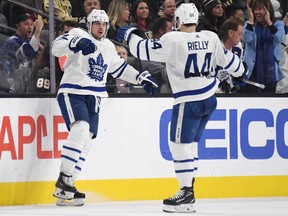 Auston Matthews and Morgan Rielly of the Toronto Maple Leafs celebrate after Rielly assisted on Matthews' second-period power-play goal against the Vegas Golden Knights during their game at T-Mobile Arena on February 14, 2019 in Las Vegas, Nevada.  (Photo by Ethan Miller/Getty Images)