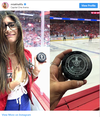 The aftermath. Mia Khalifa with the puck in question. INSTAGRAM