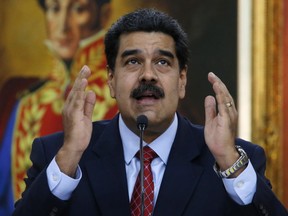 In this file photo dated Jan. 25, 2019, Venezuelan President Nicolas Maduro gives a press conference at Miraflores presidential palace in Caracas, Venezuela.