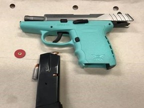 Cops also seized this semi-automatic Saturday Night Special from one of the accused killers.