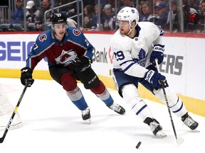 Maple Leafs forward William Nylander carries the puck behind the net of the Colorado Avalanche on Tuesday night. Nylander has been playing more like his old self of late. (Matthew Stockman/Getty Images)
