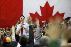 Prime Minister Justin Trudeau looks to the crowd as he takes questions at a town hall event in Milton, Ont. on Jan. 31, 2019.