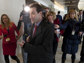 Chair Anthony Housefather is questioned by reporters as he arrives for a meeting of the House Justice and Human Rights Committee in Ottawa on Wednesday Feb. 13, 2019.