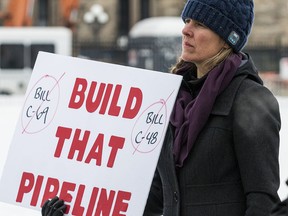 Pro-pipeline supporters arrived in a convoy from Alberta and other parts of the country for the second day to protest against the Liberal government on Parliament Hill in Ottawa on Wednesday, Feb. 20, 2019. (Errol McGihon/Postmedia)