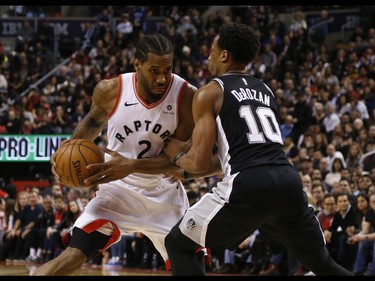 Toronto Raptors Kawhi Leonard SF (2) goes up against San Antonio Spurs DeMar DeRozan SG (10) during the fourth quarter in Toronto, Ont. on Saturday February 23, 2019. Jack Boland/Toronto Sun/Postmedia Network
