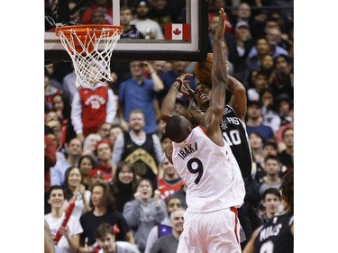 Toronto Raptors Serge Ibaka C (9) blocks San Antonio Spurs DeMar DeRozan SG (10) during the fourth quarter in Toronto, Ont. on Friday February 22, 2019. Jack Boland/Toronto Sun/Postmedia Network