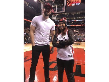 Cameron Tuskey (L) and his friend Yasmin Soul under the bucket were all happy for the return of their hero DeMar DeRozan, of the San Antonio Spurs in Toronto, Ont. on Friday February 22, 2019. Jack Boland/Toronto Sun/Postmedia Network