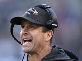 In this Oct. 21, 2018, file photo, Baltimore Ravens coach John Harbaugh stands on the sideline during the first half of the team's NFL football game against the New Orleans Saints in Baltimore.