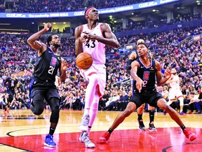 Toronto Raptors forward Pascal Siakam (43) loses control of the ball while under pressure from L.A. Clippers guards Patrick Beverley (21) and Shai Gilgeous-Alexander (2)during first half NBA basketball action in Toronto on Sunday Feb. 3, 2019. THE CANADIAN PRESS/Frank Gunn