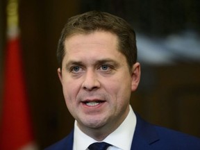 Conservative Leader Andrew Scheer holds a press conference in reaction to Jody Wilson-Raybould's appearance at the House of Commons Justice Committee on Parliament Hill in Ottawa on Wednesday, Feb. 27, 2019. THE CANADIAN PRESS/Sean Kilpatrick ORG XMIT: SKP136