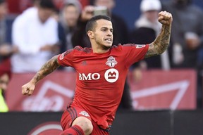 TFC's Sebastian Giovinco celebrates his penalty kick goal against the Chicago Fire during first half MLS soccer action in Toronto October 23, 2016.  THE CANADIAN PRESS/Frank Gunn